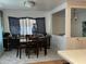 Dining area with dark wood table and chairs at 3991 Bennett Dr, Indianapolis, IN 46254