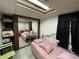 Basement bedroom with a twin-size bed and mirrored closet at 3991 Bennett Dr, Indianapolis, IN 46254
