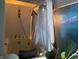 Walk-in shower with a bathtub and updated vanity at 3991 Bennett Dr, Indianapolis, IN 46254