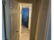 Hallway with doors to bedrooms and a bathroom at 3991 Bennett Dr, Indianapolis, IN 46254