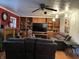 Spacious living room with built-in shelving and a large TV at 3991 Bennett Dr, Indianapolis, IN 46254