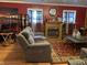 Living room with fireplace, comfortable seating, and area rug at 3991 Bennett Dr, Indianapolis, IN 46254