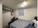 Basement bedroom with a queen-size bed and closet at 3991 Bennett Dr, Indianapolis, IN 46254