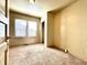 Charming bedroom with carpet flooring, two windows, and a closet at 1750 Linden St, Indianapolis, IN 46203