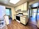 Galley kitchen featuring light cabinets and laminate flooring at 1750 Linden St, Indianapolis, IN 46203