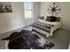 Charming bedroom with a cowhide rug and western decor at 13088 Lansdowne Dr, Fishers, IN 46038