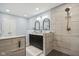 Modern bathroom with a walk-in shower, double vanity, and stylish finishes at 1724 Sunrise Cir, Indianapolis, IN 46229