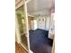 Sunroom with tiled floor and exterior access at 7722 Shady Hills W Dr, Indianapolis, IN 46278