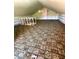 Spacious attic with carpet, built-in shelving, and window at 7722 Shady Hills W Dr, Indianapolis, IN 46278
