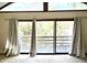 Bright bedroom with sliding glass doors to deck at 7722 Shady Hills W Dr, Indianapolis, IN 46278