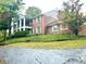 Brick house exterior with a driveway at 7722 Shady Hills W Dr, Indianapolis, IN 46278