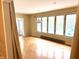Bright dining room with hardwood floors and patio doors at 7722 Shady Hills W Dr, Indianapolis, IN 46278