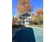 Inviting pool with pool cover and adjacent cabana, perfect for relaxation at 7722 Shady Hills W Dr, Indianapolis, IN 46278