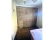 Unfinished basement with exposed brick wall at 7722 Shady Hills W Dr, Indianapolis, IN 46278