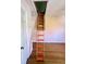 Accessible attic space with pull-down stairs and shelving at 7722 Shady Hills W Dr, Indianapolis, IN 46278