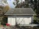 Detached white garage with single door at 7722 Shady Hills W Dr, Indianapolis, IN 46278