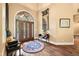 Grand entryway with hardwood floors and arched doorway at 2733 Foxborough Dr, Greenwood, IN 46143