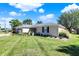 Brick ranch house with attached garage and landscaping at 3005 Olive Branch Rd, Greenwood, IN 46143