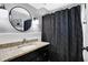 Clean bathroom with granite countertop and dark vanity at 3005 Olive Branch Rd, Greenwood, IN 46143