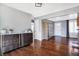 Hardwood floors and a mirrored cabinet at 3005 Olive Branch Rd, Greenwood, IN 46143