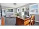 Sunlit home office, featuring a large desk and comfortable seating at 3005 Olive Branch Rd, Greenwood, IN 46143