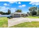 Brick ranch house with attached garage and landscaping at 3005 Olive Branch Rd, Greenwood, IN 46143