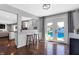 White cabinets, granite countertops, and stainless steel appliances at 3005 Olive Branch Rd, Greenwood, IN 46143