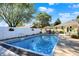 Inviting in-ground pool with spacious patio and lounge area at 3005 Olive Branch Rd, Greenwood, IN 46143