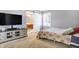 Comfortable bedroom with a large bed and en-suite bathroom at 3005 Olive Branch Rd, Greenwood, IN 46143