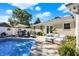 Relaxing poolside patio with comfortable seating and landscaping at 3005 Olive Branch Rd, Greenwood, IN 46143