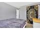 Simple bedroom with a double bed and ample closet space at 3005 Olive Branch Rd, Greenwood, IN 46143