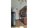 Galley kitchen with dark wood cabinets and appliances at 2721 Del Prado Dr, Indianapolis, IN 46227