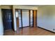 Simple bedroom with wood flooring and built-in shelves at 2721 Del Prado Dr, Indianapolis, IN 46227