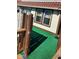 Home exterior with a private deck and artificial turf at 2721 Del Prado Dr, Indianapolis, IN 46227
