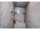 Walk-in shower with granite tile and built-in shelves at 6502 Allisonville Rd, Indianapolis, IN 46220