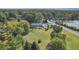 Property view showing home, large yard, and road at 6502 Allisonville Rd, Indianapolis, IN 46220