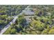 Large property view with home and surrounding area at 6502 Allisonville Rd, Indianapolis, IN 46220