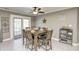 Eat-in kitchen with wood table and access to backyard at 6502 Allisonville Rd, Indianapolis, IN 46220