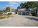 Three-car garage and stone exterior at 6502 Allisonville Rd, Indianapolis, IN 46220