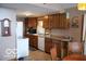 Cozy kitchen with wood cabinets and a dishwasher at 7477 Honey Locust Dr, Nineveh, IN 46164