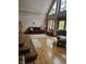 Spacious living room with hardwood floors and large windows at 7477 Honey Locust Dr, Nineveh, IN 46164