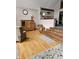 Living area features hardwood floors and a wooden cabinet at 7477 Honey Locust Dr, Nineveh, IN 46164