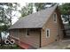 Lake house exterior with a view of the side and back at 7477 Honey Locust Dr, Nineveh, IN 46164