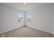 Bright bedroom with two windows and carpeted floors at 4231 Barrel Ln, Westfield, IN 46062