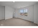 Bright bedroom with carpeted floor and large window at 4231 Barrel Ln, Westfield, IN 46062