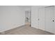 Well-lit bedroom with door to hallway and double closets at 4231 Barrel Ln, Westfield, IN 46062