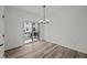 Simple dining room with sliding glass door to balcony at 4231 Barrel Ln, Westfield, IN 46062