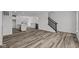 Open concept living room with hardwood floors and kitchen views at 4231 Barrel Ln, Westfield, IN 46062