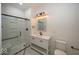 Updated bathroom with white vanity, a glass shower, and modern fixtures at 1666 Union St, Indianapolis, IN 46225