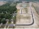 Aerial view of new home community near a lake at 7856 Magnolia St, New Palestine, IN 46163